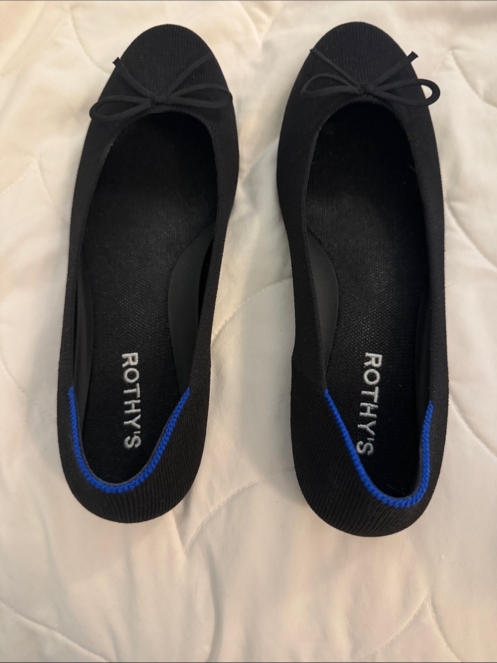 Rothy's Black Ballet Flats with Blue Trim